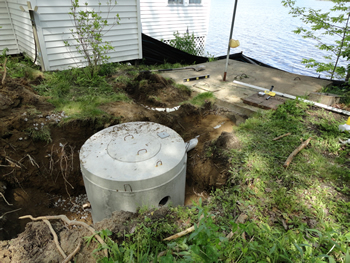 Rossignol's Excavating installing a Septic Pump Station.