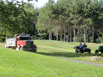 Loam delivery to the Waterville Country Club by Rossignol's Excavating.